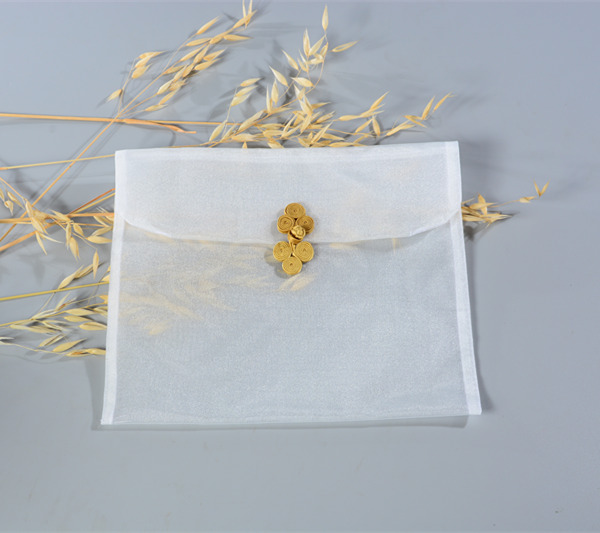 golden organza gift bag with tassels drawstring