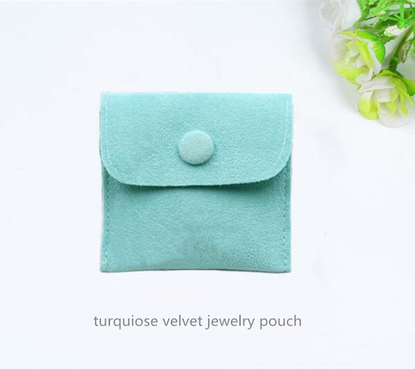 green velvet jewelry pouch with button