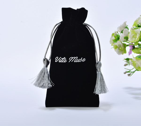 black velvet gift bag with silver tassels